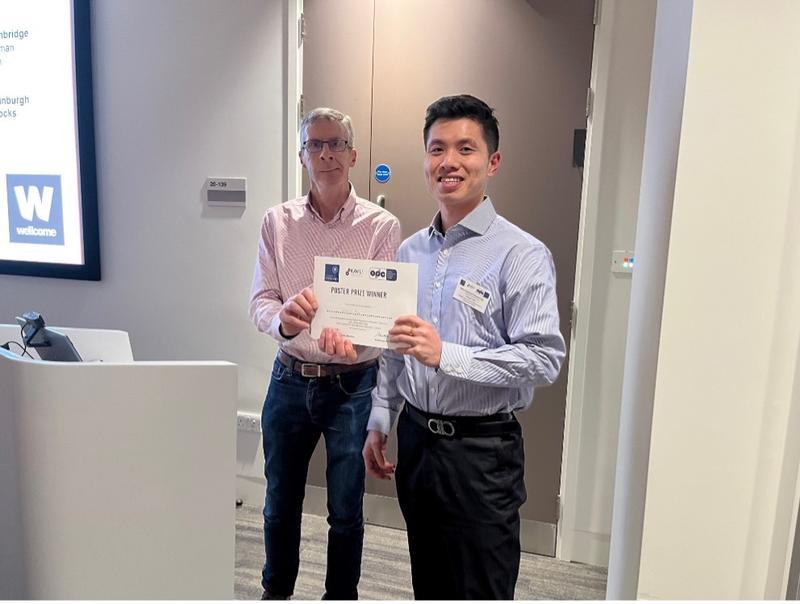 Dr Kevin McFarthing, Research Advisor, Parkinson’s UK Oxford Branch, presenting a certificate to Victor (Shijun) Yan, from the Molecular Neurodegeneration Research Group, University of Oxford.