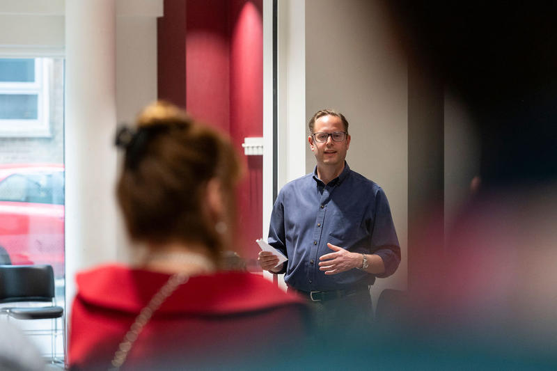 Professor Justin Benesch giving the speech during the ceremony to rename the ‘Carol Robinson Seminar Room’ at the 5th birthday symposium held by Oxford's Kavli Institute for Nanoscience Discovery.