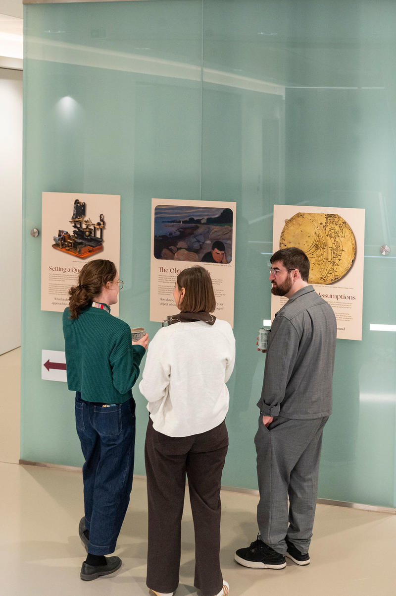 Treasa O’Hagan (Doctoral Student), Dr Emily Machala and Dr Jose Prius Mengual discussing the posters forming part of a pop-up ethics exhibition at the 5th birthday symposium held by Oxford's Kavli Institute for Nanoscience Discovery (Kavli INsD)