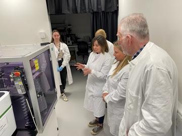 Becky Carlyle giving the tour to the Alzheimer’s Research UK
