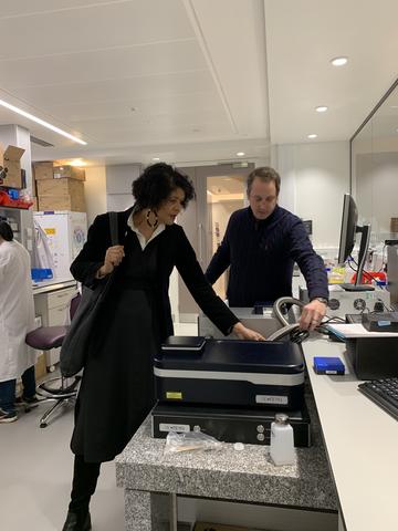 Photo of Chi Onwurah and Dr Weston Struwe discussing mass photometry