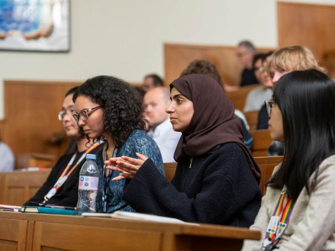 Dr Tamaris Borges da Silva and Sarah Almutawa (Doctoral Student) attending a research talk at Oxford's Kavli Institute for Nanoscience Discovery 5th birthday symposium