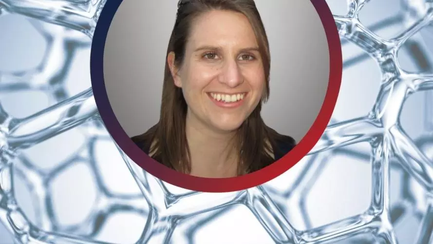 Picture of Doctor Lindsay Baker in front of a light blue background with a cellular texture
