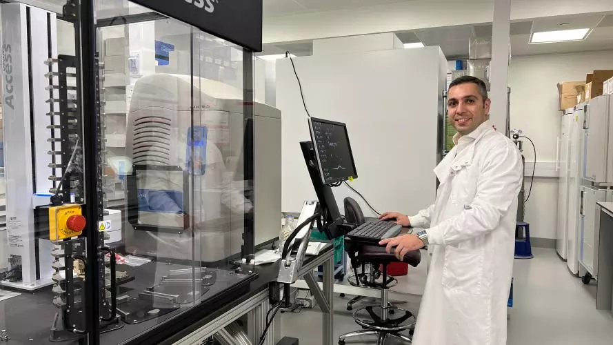 Photo of Mootaz Salman working in the lab.