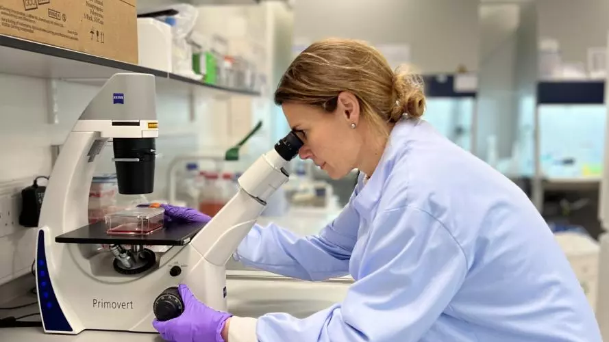 Professor Esther Becker working in the lab.