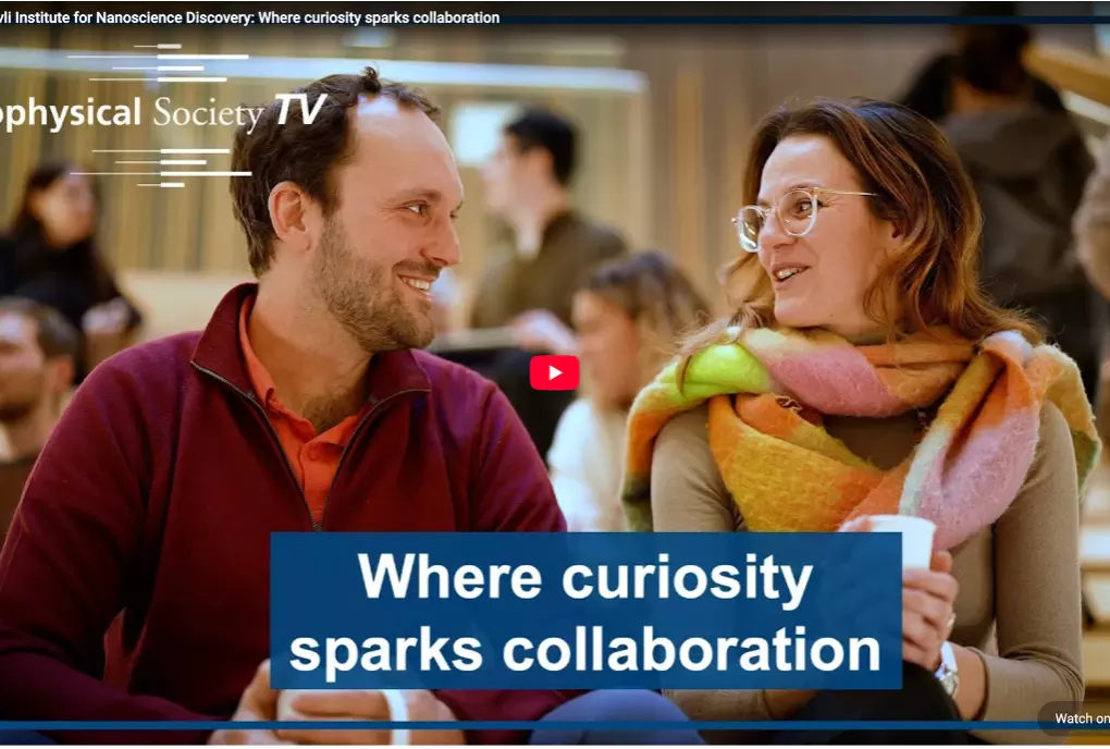 Screenshot of a Biophysical Society TV feature about the Kavli Institute for Nanoscience Discovery, showing two researchers chatting in a busy communal space. Text overlay reads “Where curiosity sparks collaboration.”